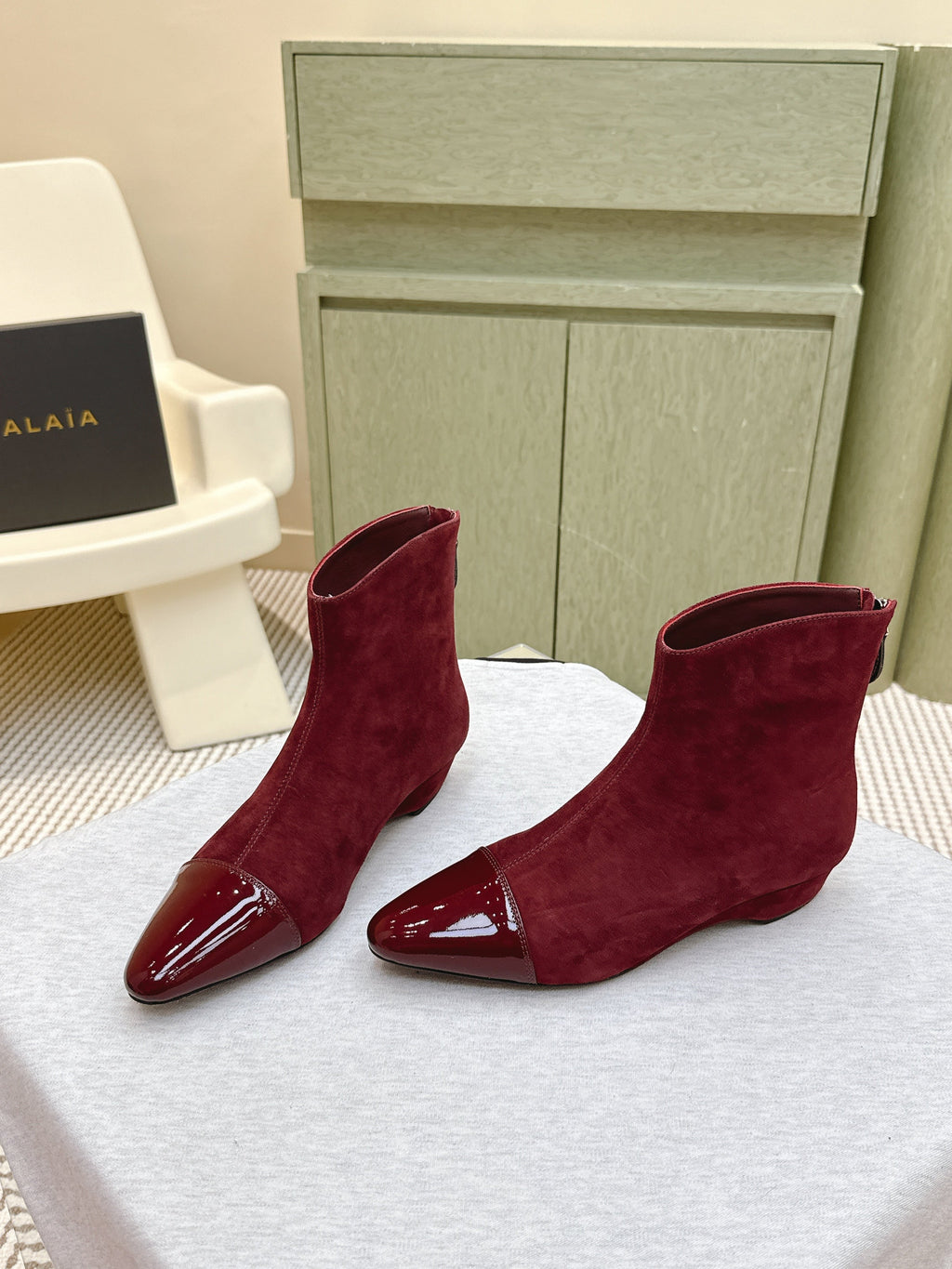 ALAIA 26S ANKLE BOOTS IN DARK RED SUEDE AND GLOSSY CALFSKIN