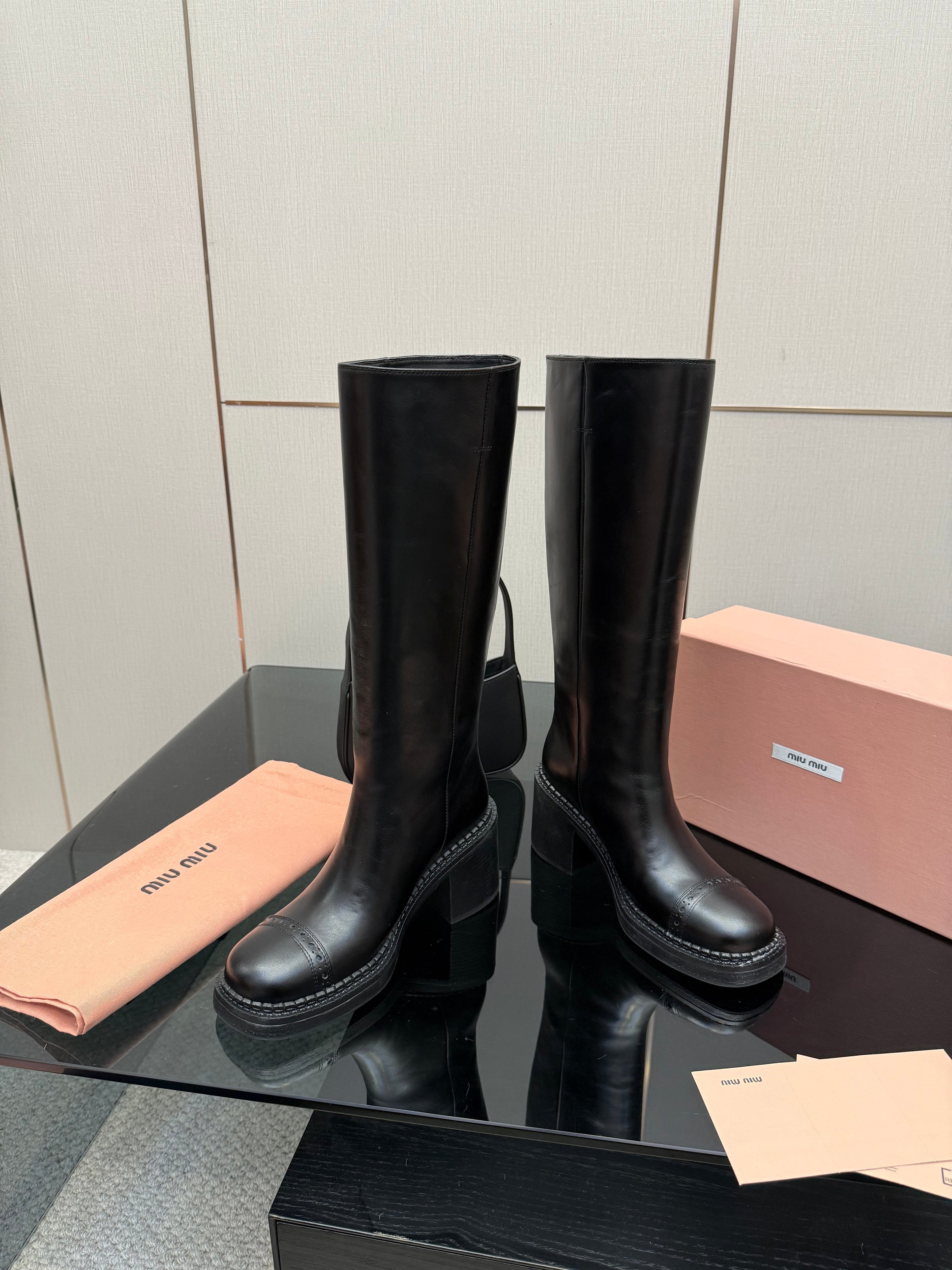 MIUMIU 25S KNEE-HIGH BOOTS IN BLACK CALFSKIN