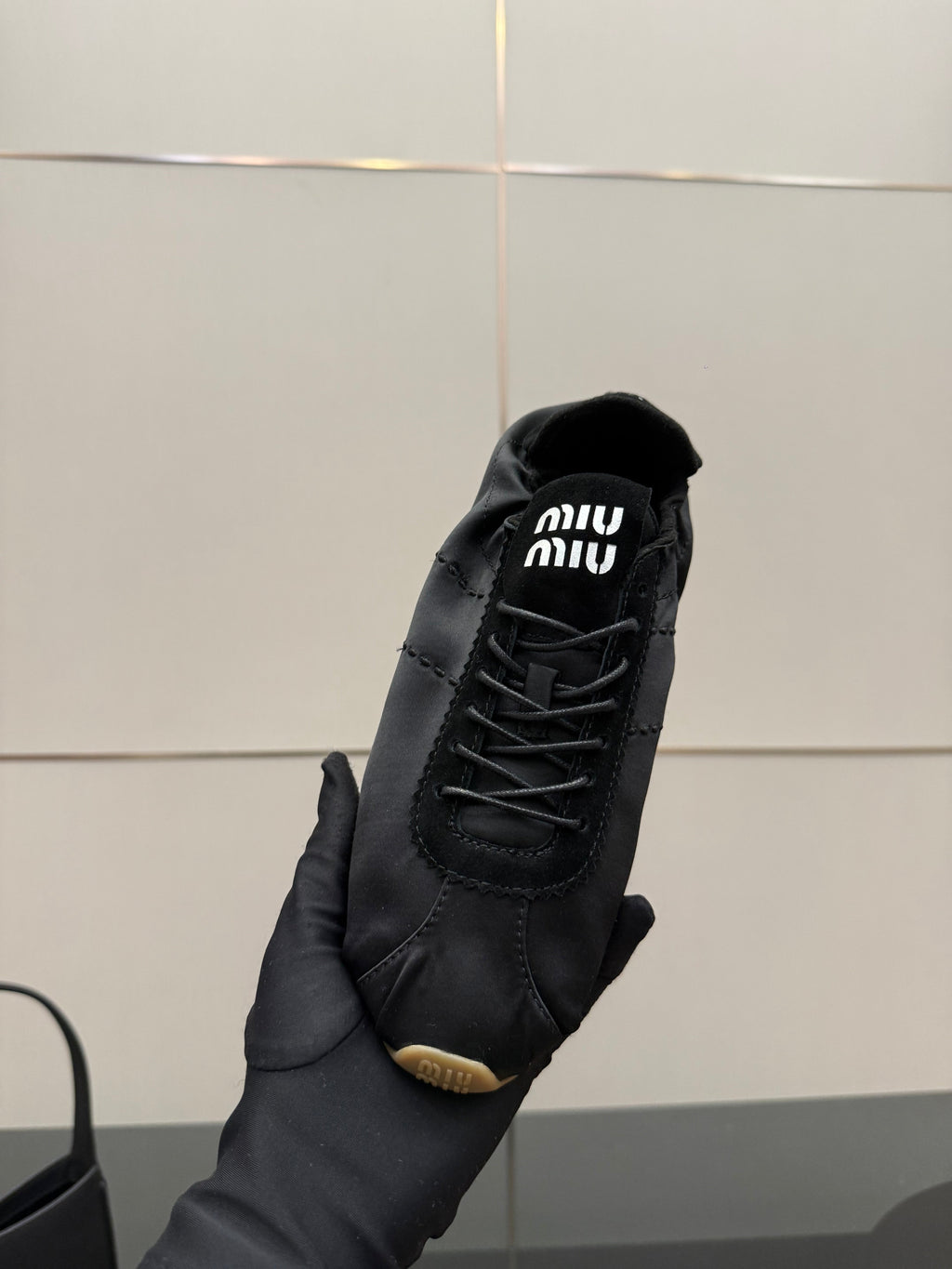 MIUMIU 25S SNEAKERS IN BLACK PLUME SATIN