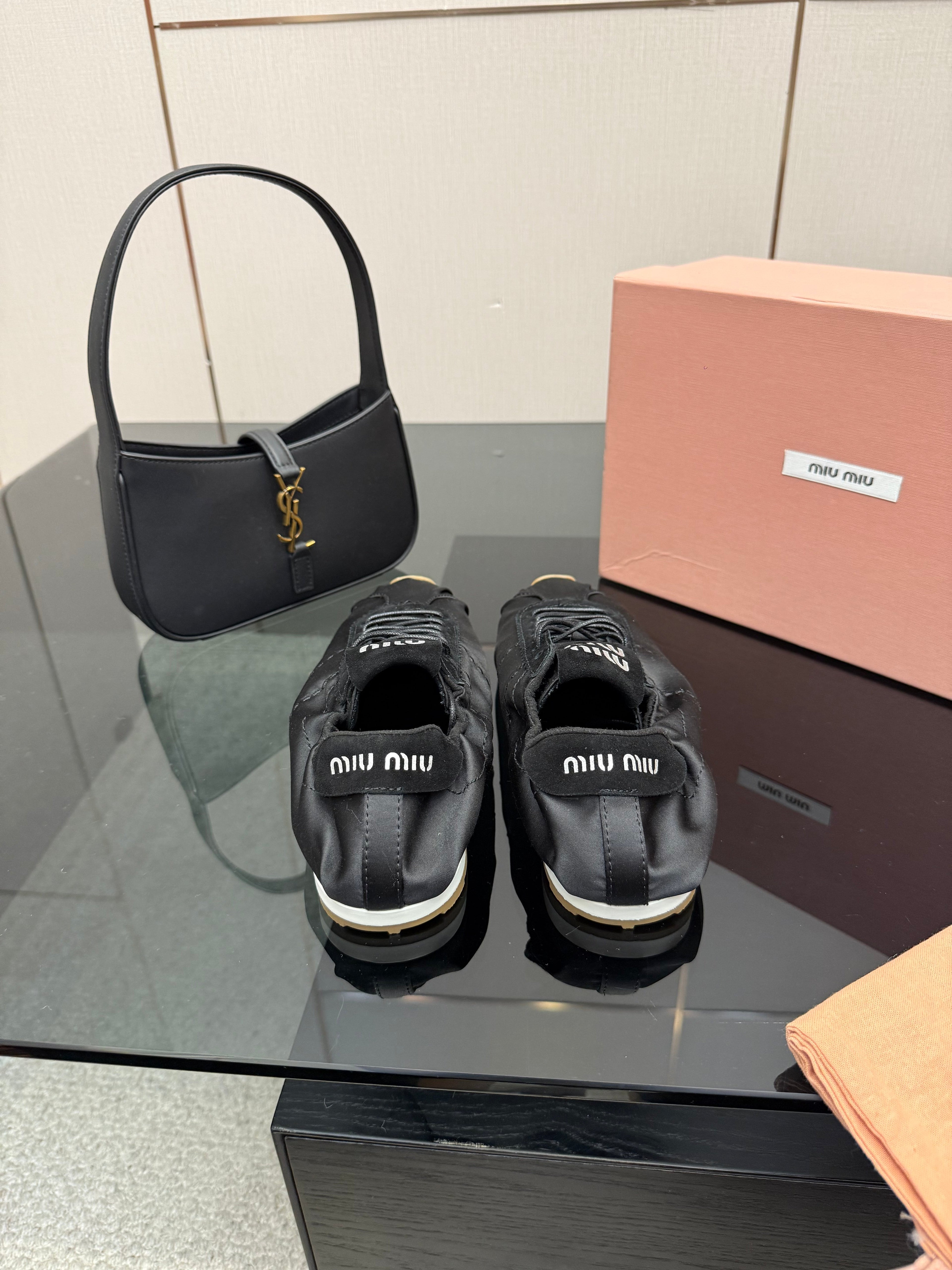 MIUMIU 25S SNEAKERS IN BLACK PLUME SATIN