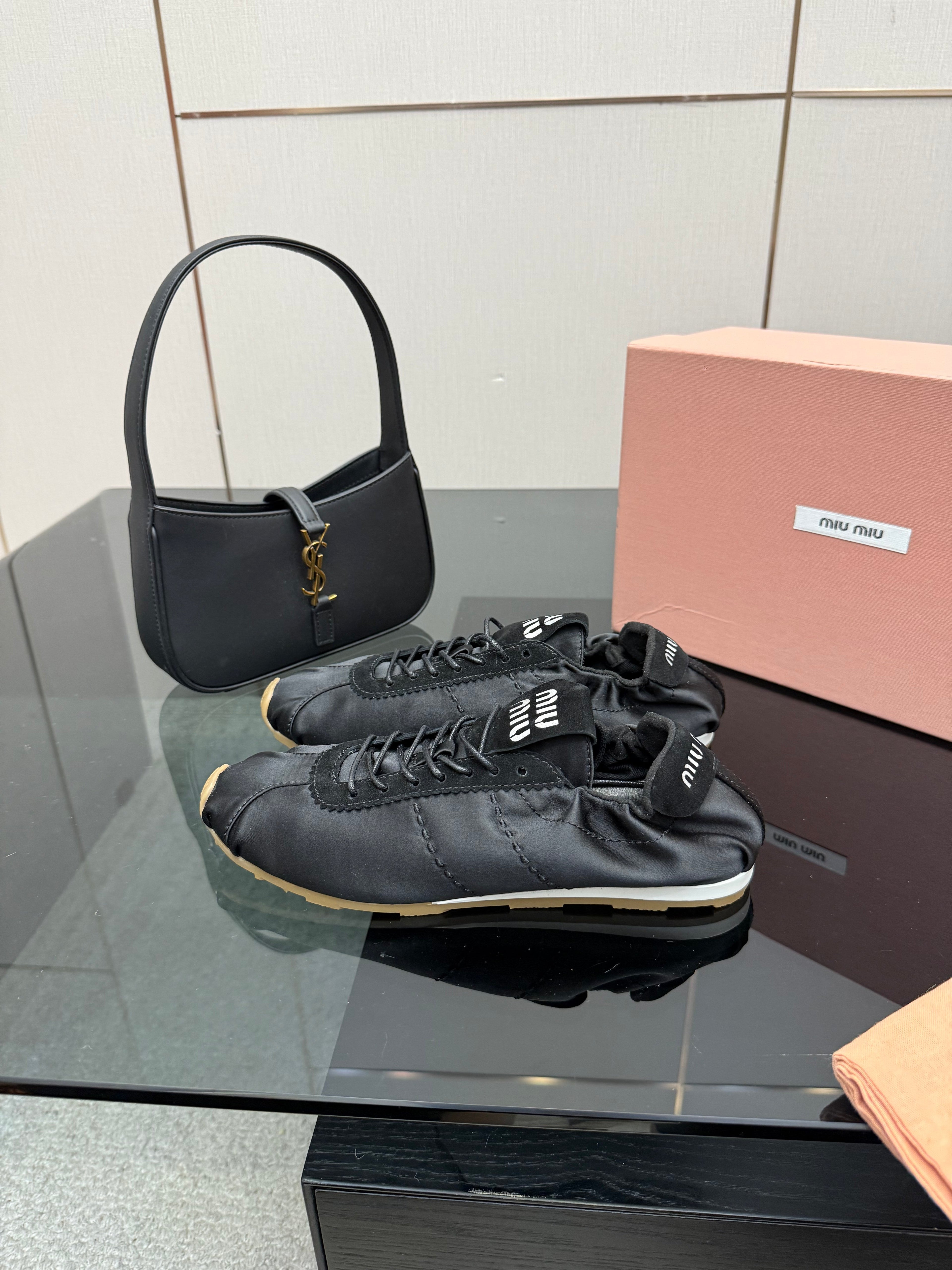 MIUMIU 25S SNEAKERS IN BLACK PLUME SATIN