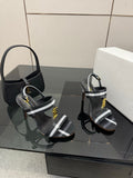 BURBERRY 26S HIGH-HEELED SANDALS 100 MM IN BLACK AND WHITE STRIPES FABRIC