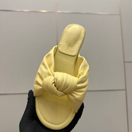BOTTEGA VENETA 26S SLIDE SANDALS IN YELLOW LAMBSKIN