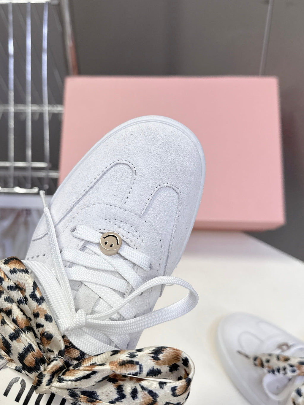 MIUMIU 25S SNEAKERS IN WHITE SUEDE WITH LEOPARD-PRINT LACES
