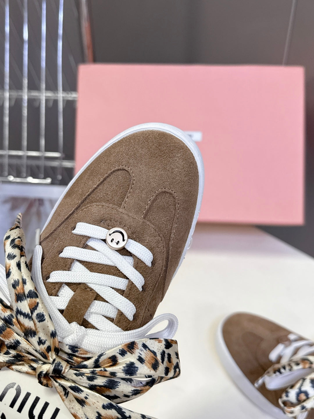 MIUMIU 25S SNEAKERS IN EARTH BROWN SUEDE WITH LEOPARD-PRINT LACES