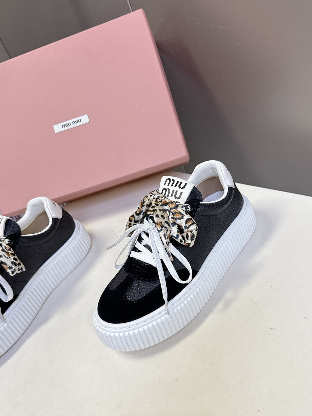 MIUMIU 25S SNEAKERS 45MM IN BLACK SUEDE WITH LEOPARD-PRINT LACES