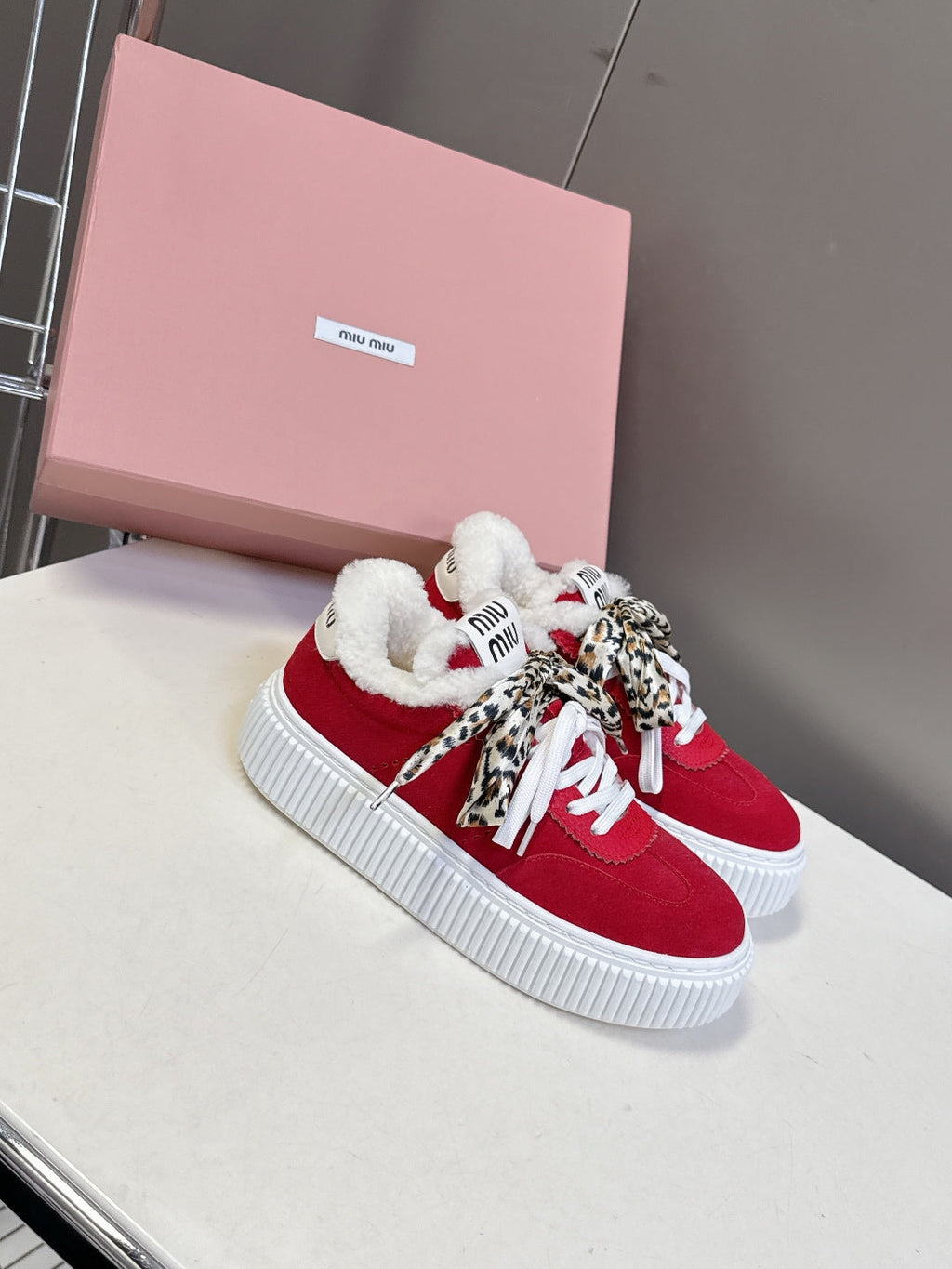 MIUMIU 25S SNEAKERS 45MM IN DARK RED SUEDE WITH LEOPARD-PRINT LACES SHEARLING