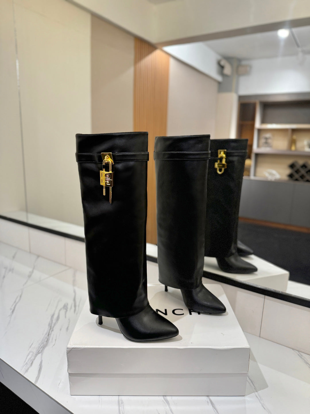 SHARK LOCK BOOTS IN BLACK CALFSKIN GOLD HARDWARE