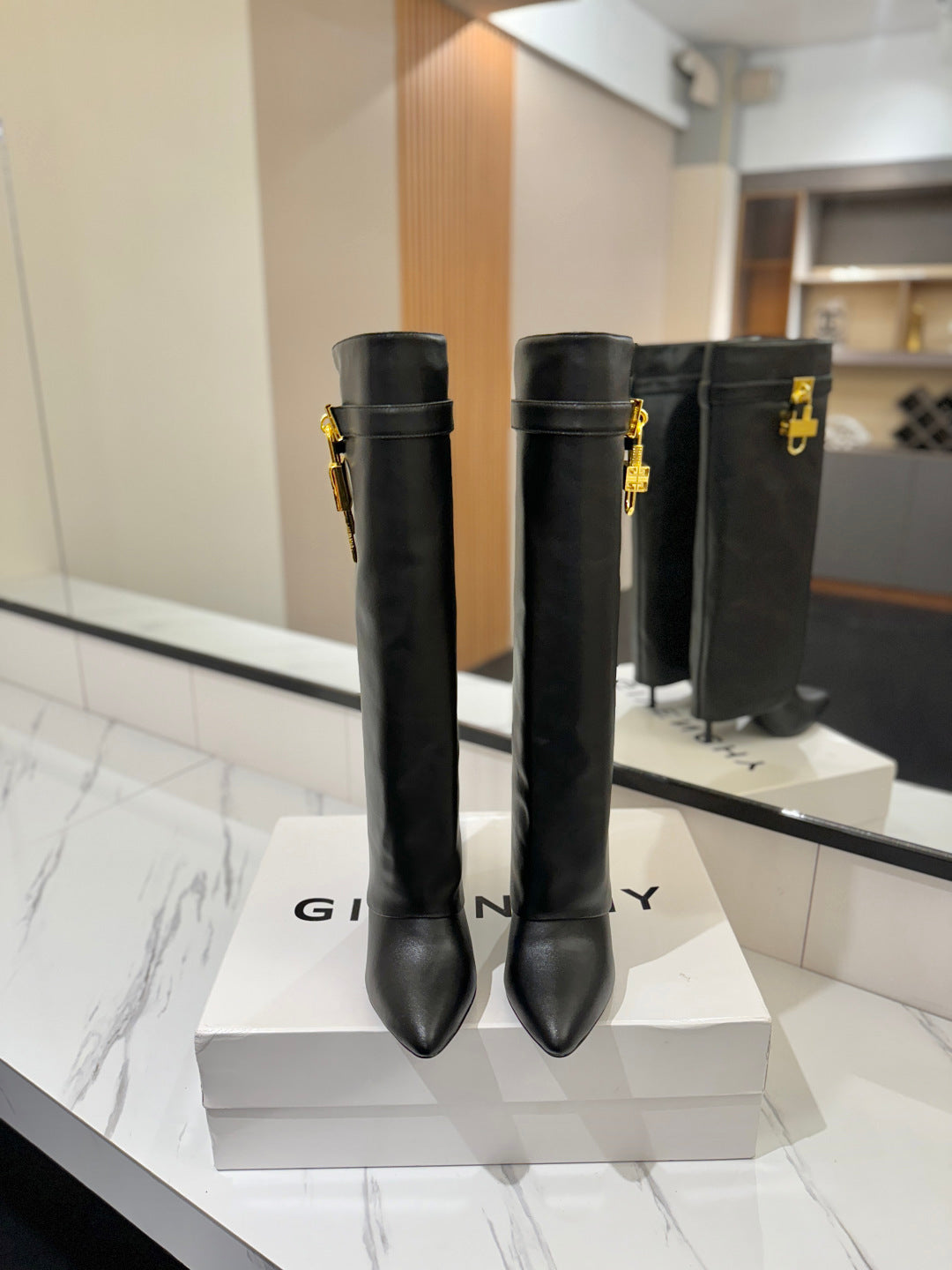 SHARK LOCK BOOTS IN BLACK CALFSKIN GOLD HARDWARE