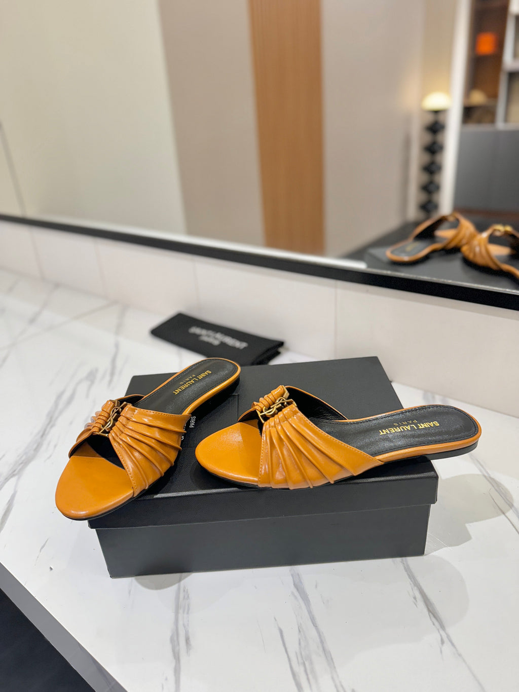 YSL 26S BABYLONE FLAT MULES IN DARK ORANGE LAMBSKIN