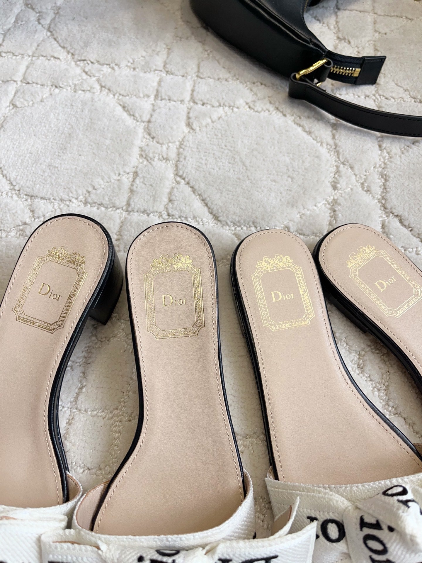 DIOR 26S DWAY SLIDE IN BLACK AND WHITE COTTON EMBOSSED LOGO
