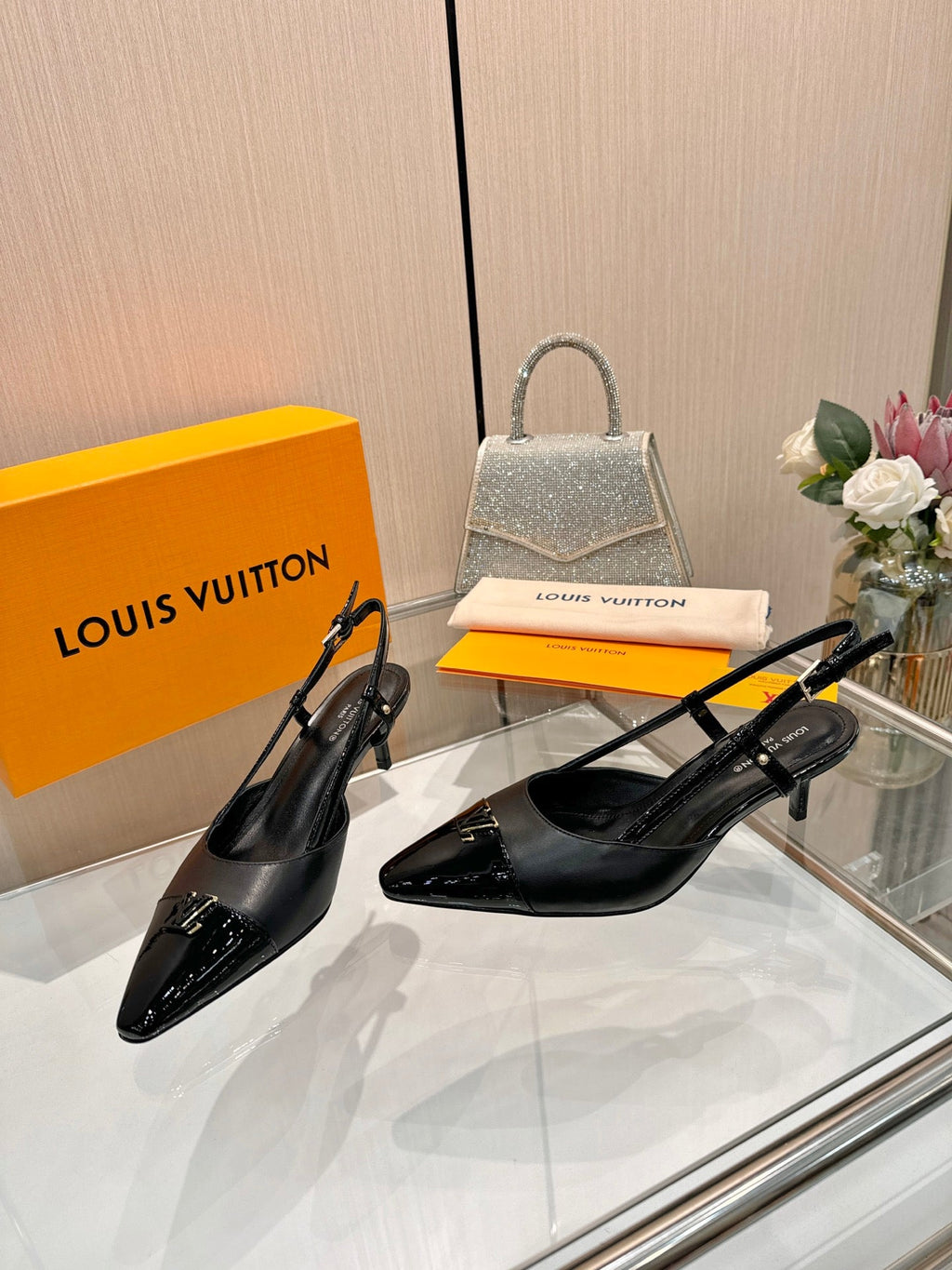 LV 26S SLINGBACK PUMPS 55 MM IN BLACK FABRIC AND CALFSKIN