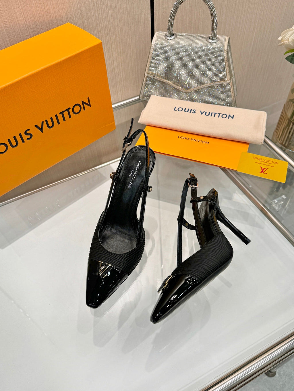 LV 26S SLINGBACK PUMPS 90 MM IN BLACK FABRIC AND CALFSKIN