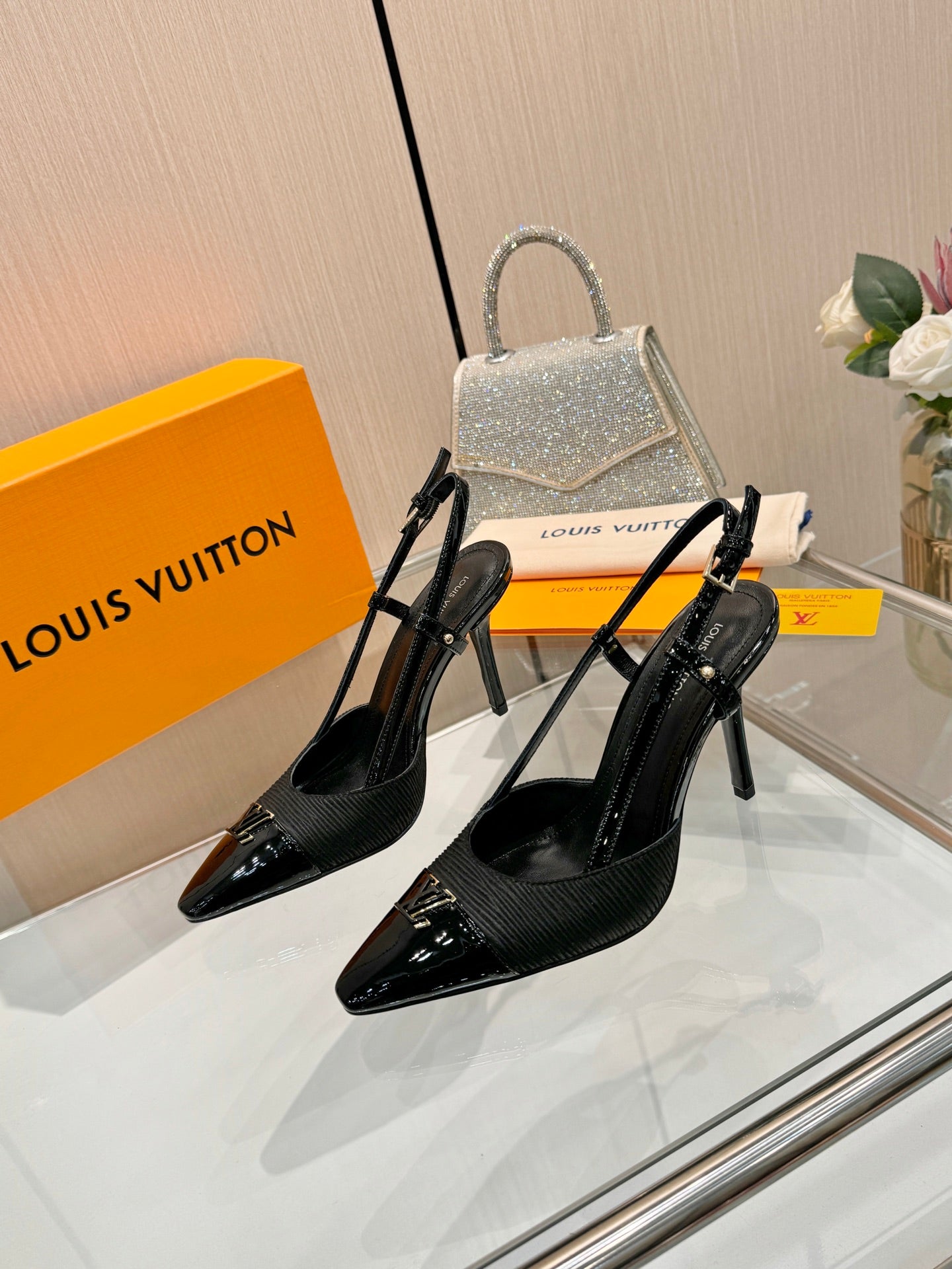 LV 26S SLINGBACK PUMPS 90 MM IN BLACK FABRIC AND CALFSKIN