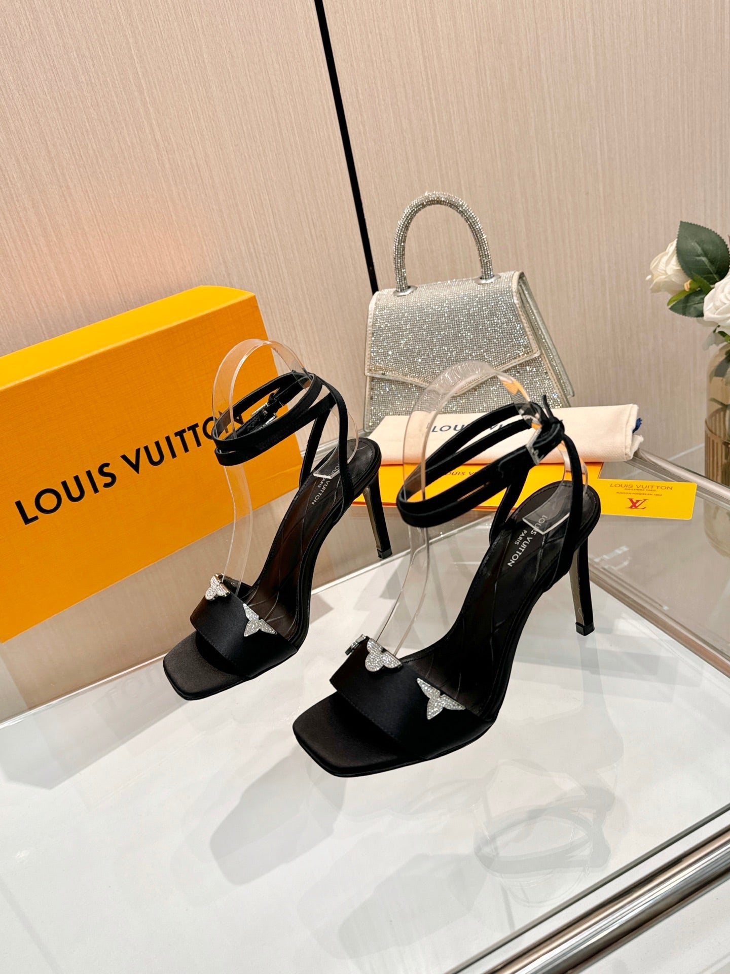 LV 26S HIGH-HEELED SANDALS 90 MM IN BLACK SATIN