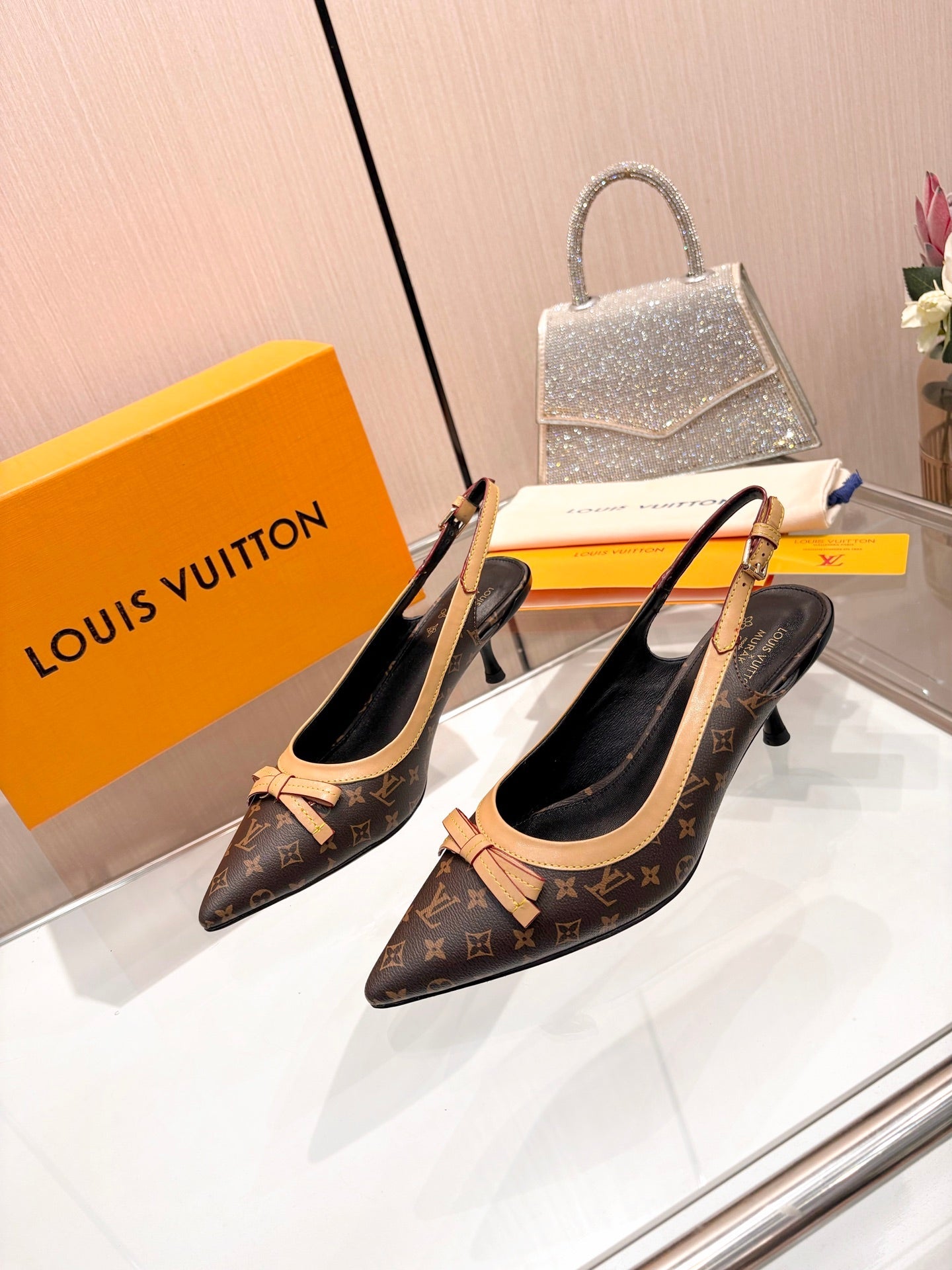 LV 26S BOW-DETAIL SLINGBACK PUMPS 55 MM IN DARK BROWN MONOGRAM CANVAS