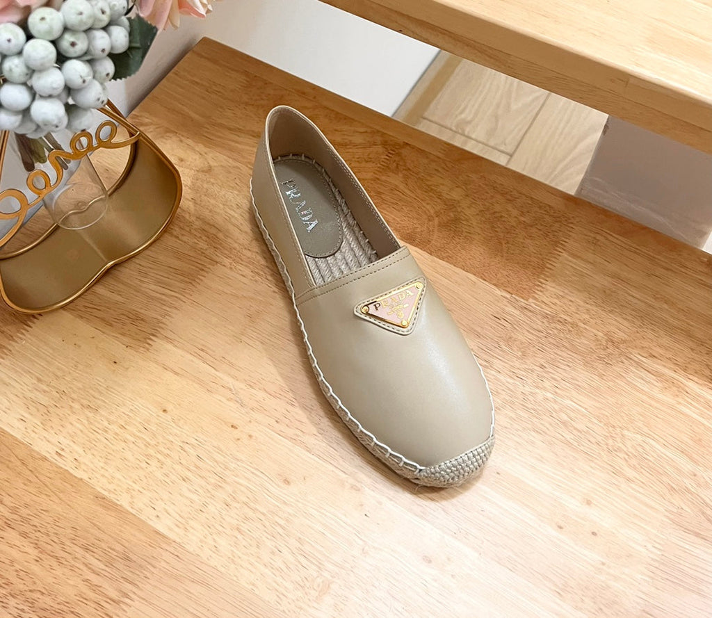 PRADA 26S LOGO ESPADRILLE SLIP ON FLATS IN DARK BEIGE CALFSKIN