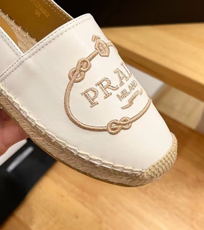 PRADA 26S EMBROIDERED LOGO ESPADRILLE FLATS IN WHITE CALFSKIN