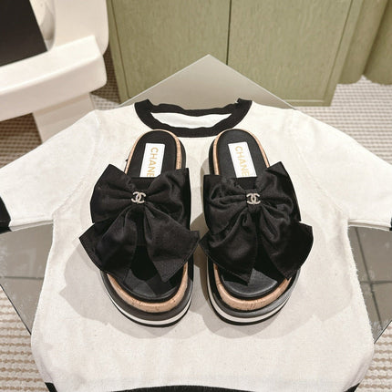 CC SLIPPERS WITH SILK BOW IN BLACK COWHIDE