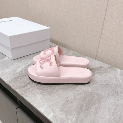THICK-SOLED SLIDES IN LIGHT PINK SMOOTH LAMBSKIN LOGO WITH CRYSTALS