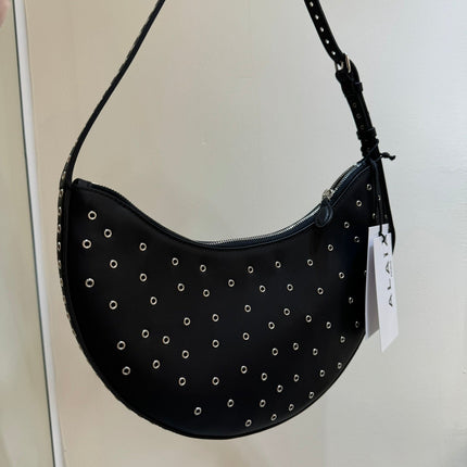 ONE PIECE DEMI LUNE BAG 31 IN BLACK SHEEPSKIN EYELET DETAILING
