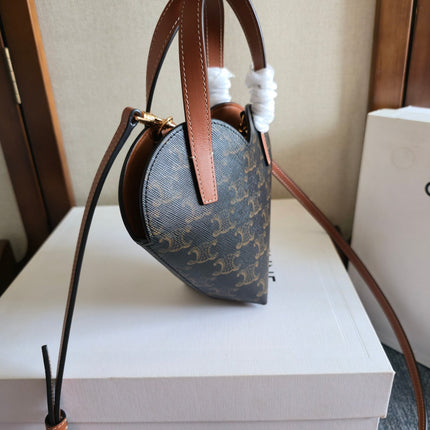 CELINE 25S TEEN COEUR BAG 19 MM IN BLACK TRIOMPHE CANVAS AND TAN CALFSKIN
