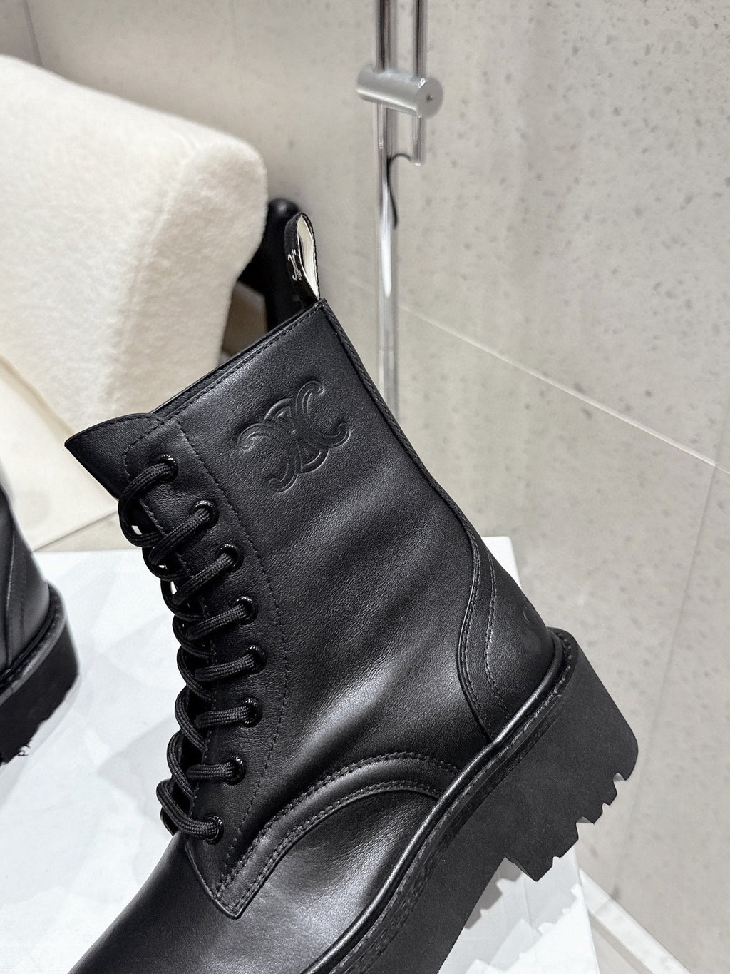 CELINE 26S CHUNKY-SOLE COMBAT BOOTS IN BLACK CALFSKIN