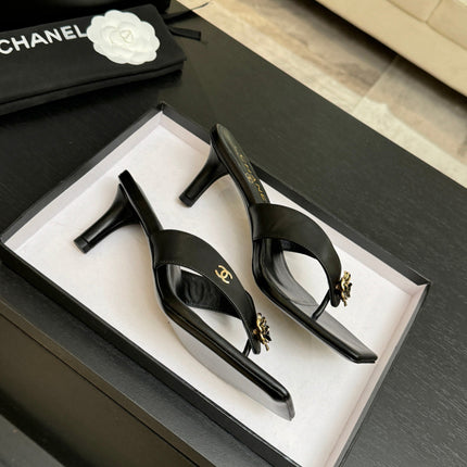 CHANEL 26S CAMELLIA THONG MULE IN BLACK LAMBSKIN