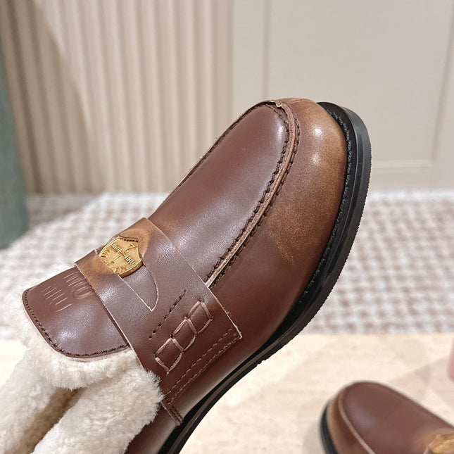 MIUMIU 25S PENNY LOAFERS 20MM IN EBONY BROWN BLEACHED CALFSKIN WITH SHEARLING
