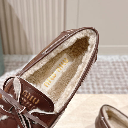 MIUMIU 25S BOAT SHOES IN SIENNA BROWN BLEACHED CALFSKIN WITH SHEARLING