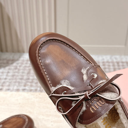MIUMIU 25S BOAT SHOES IN SIENNA BROWN BLEACHED CALFSKIN WITH SHEARLING