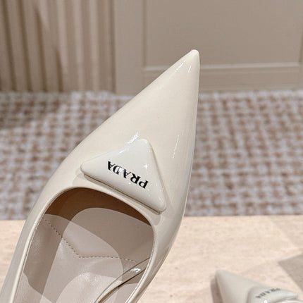 PRADA 26S POINTED-TOE SLINGBACK HEELS 75MM IN LIGHT BEIGE PATENT CALFSKIN