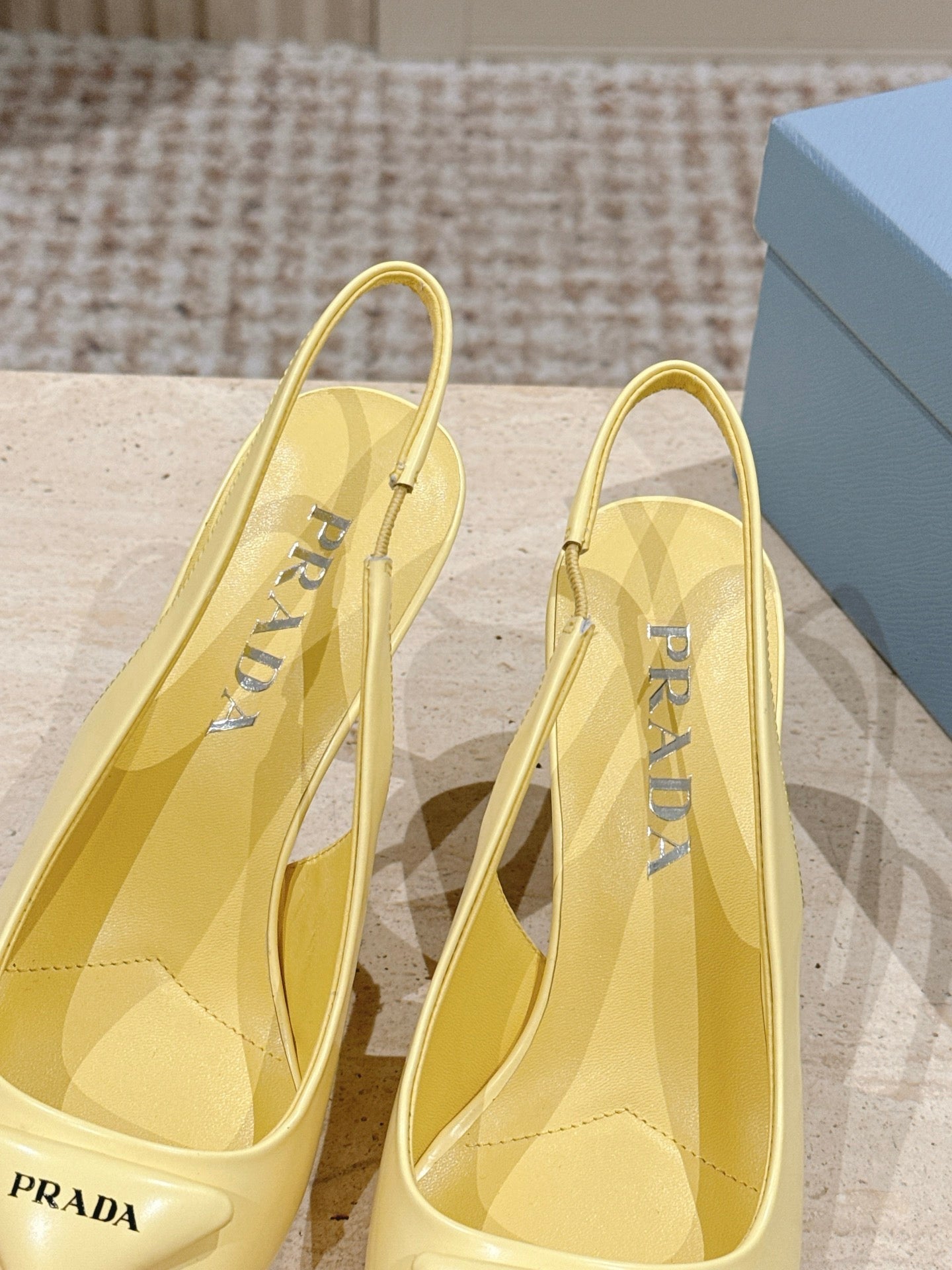 PRADA 26S POINTED-TOE SLINGBACK HEELS 75MM IN PASTEL YELLOW SHINY CALFSKIN