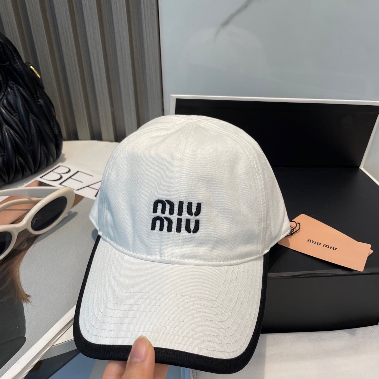 MIUMIU BASEBALL CAP IN WHITE AND BLACK FABRIC STYLE 1