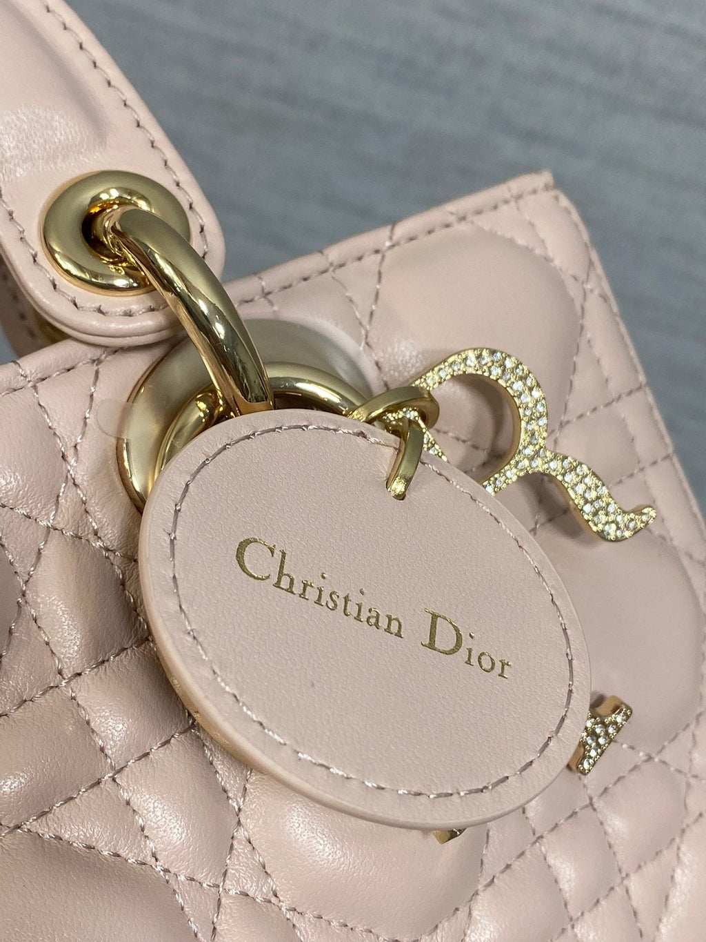 DIOR 25S SMALL LADY D‑JOY BAG 22 IN BABY PINK CALFSKIN GOLD HARDWARE