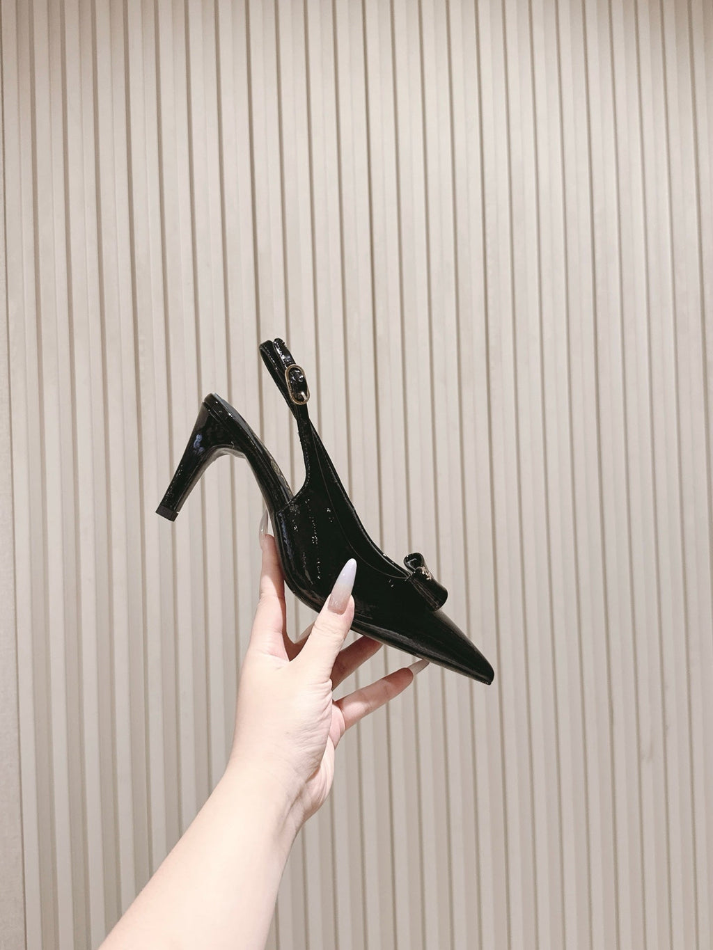 CC HIGH SLINGBACK IN BLACK LAMBSKIN WITH BOW ATTACHED