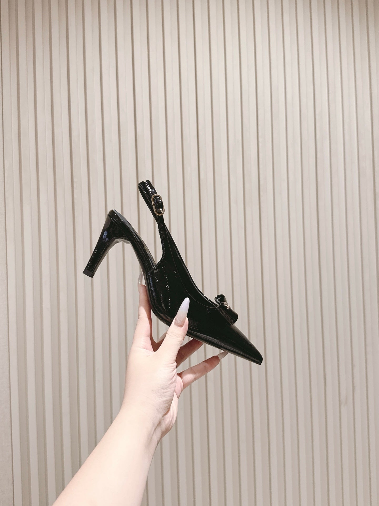 CC HIGH SLINGBACK IN BLACK LAMBSKIN WITH BOW ATTACHED