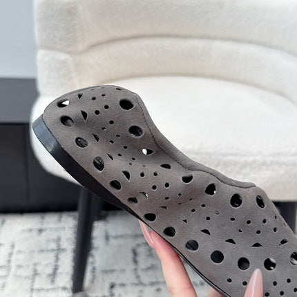 ALAIA 26S FLAT SLIP-ONS IN GREY SUEDE WITH OPENWORK PATTERN