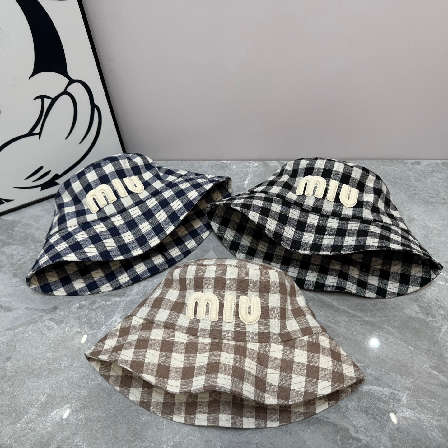 MIUMIU BUCKET CHECKED PATTERN WITH LOGO