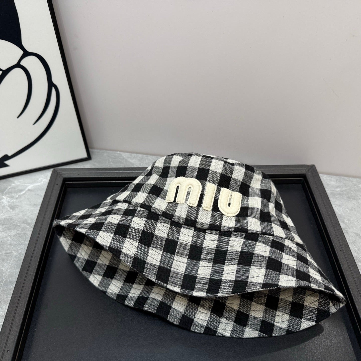 MIUMIU BUCKET CHECKED PATTERN WITH LOGO