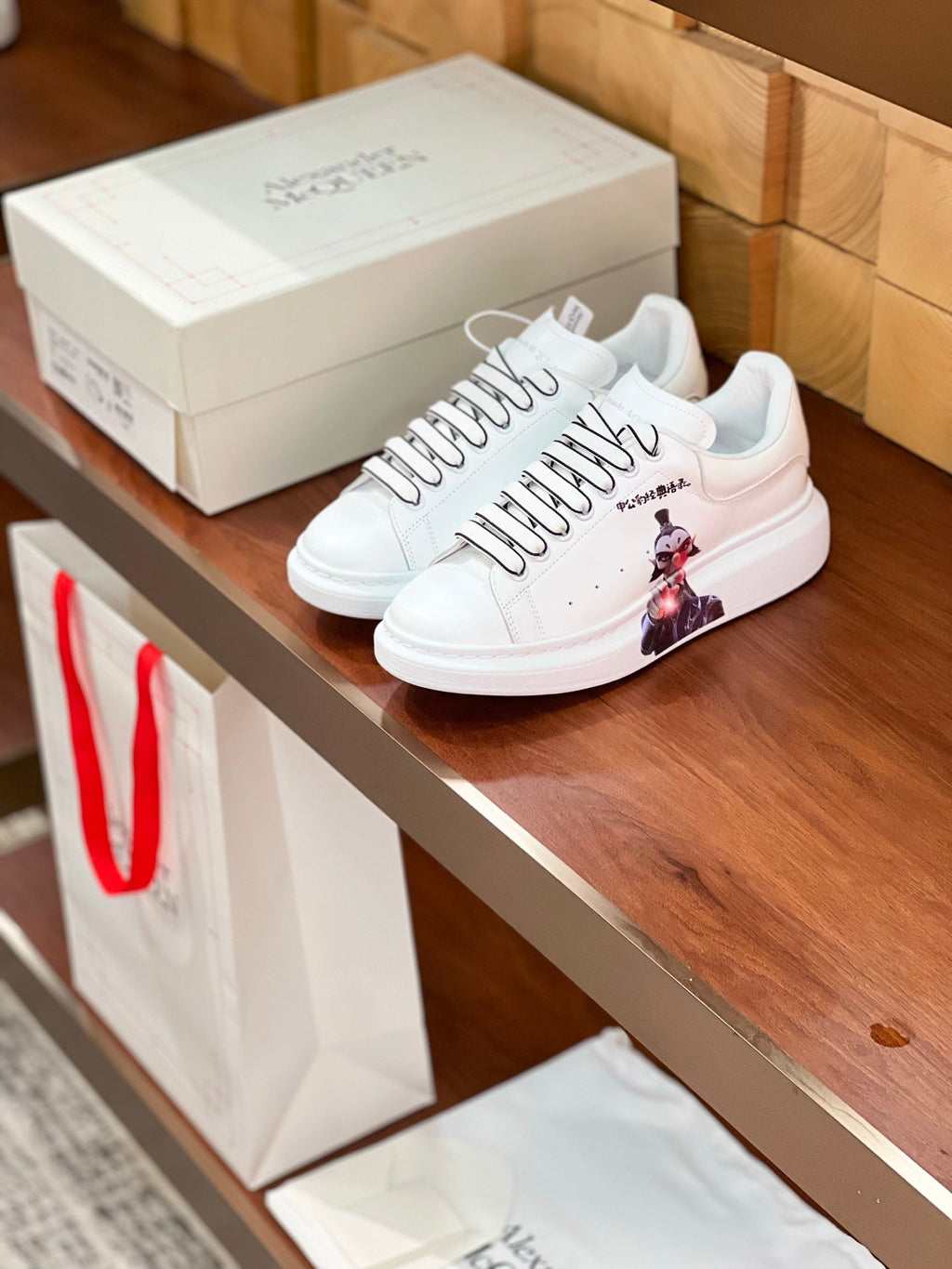 OVERSIZED SNEAKERS IN WHITE CALFSKIN CARTOON FIGURE BLACK TRIM LACES