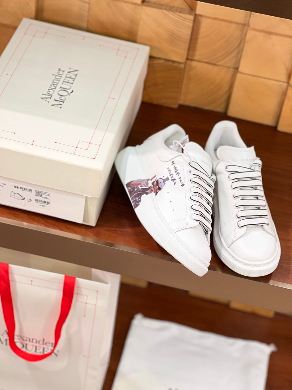 OVERSIZED SNEAKERS IN WHITE CALFSKIN CARTOON FIGURE BLACK TRIM LACES