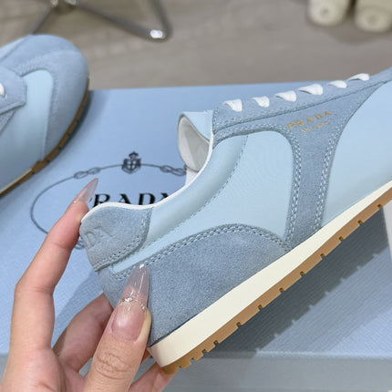 PRADA 26S LACE UP SNEAKERS IN LIGHT BLUE NYLON AND SUEDE