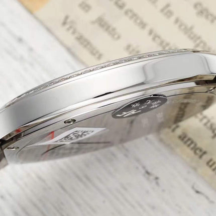 RONDE MUST DE CARTIER WATCH SILVER CASE AND GREEN DIAL WITH CRYSTALS