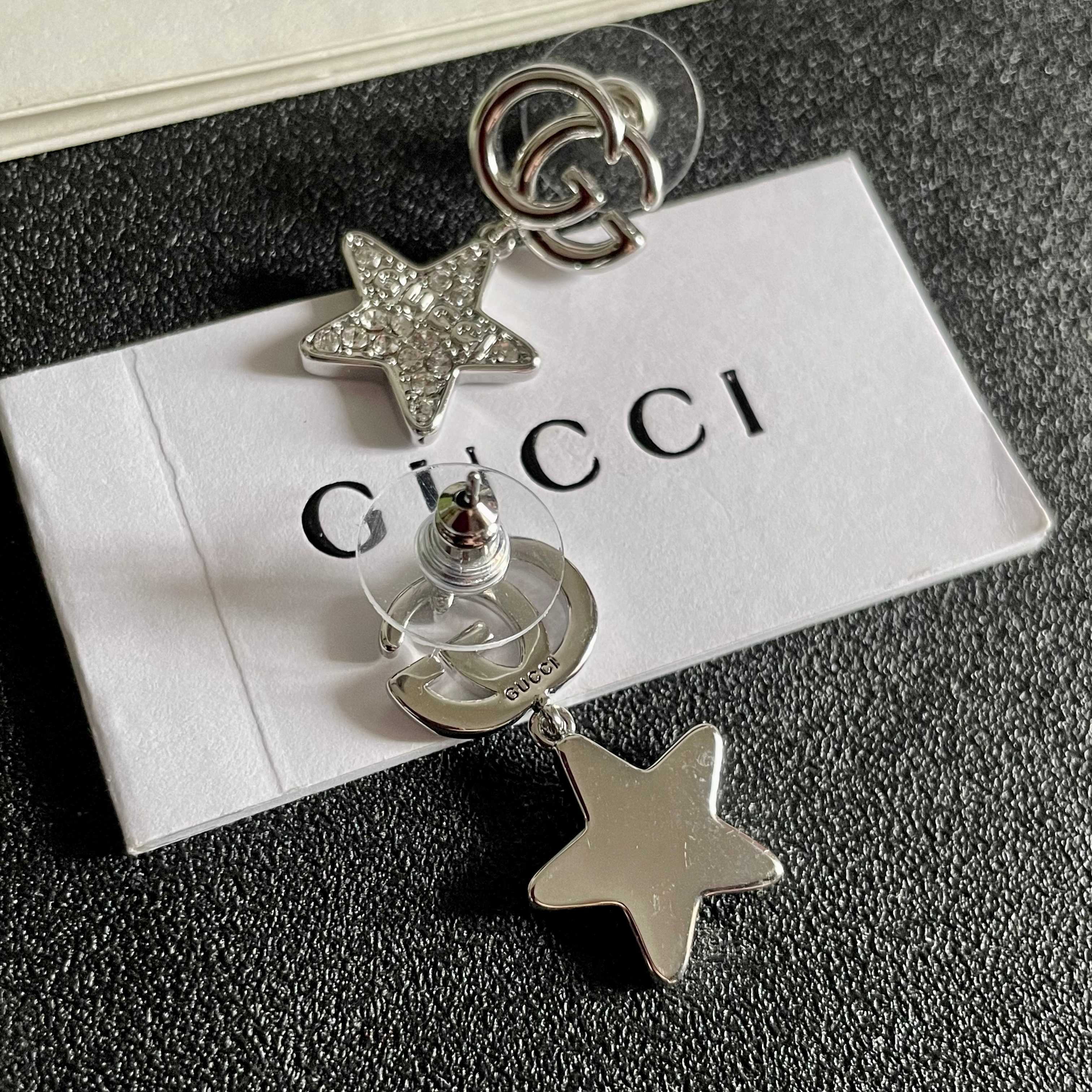 GUCCI 26S DOUBLE G STAR CRYSTAL DROP EARRINGS IN SILVER TONE METAL 627016