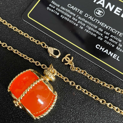 CHANEL 26S DOUBLE C LOGO ORANGE RESIN STATEMENT PENDANT NECKLACE IN GOLD METAL 629172
