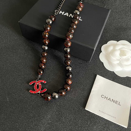 CHANEL 26S DOUBLE C LOGO RED CRYSTAL BEADED NECKLACE IN BLACK METAL 629968