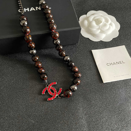 CHANEL 26S DOUBLE C LOGO RED CRYSTAL BEADED NECKLACE IN BLACK METAL 629968