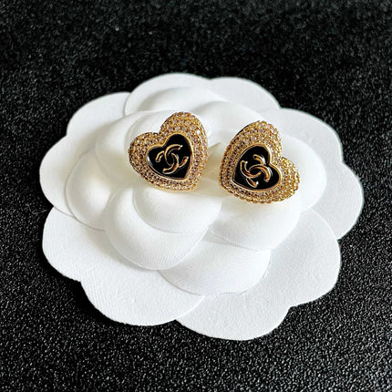 CHANEL 26S DOUBLE C LOGO PAVE HEART STUD EARRINGS WITH BLACK ENAMEL IN GOLD METAL 631814