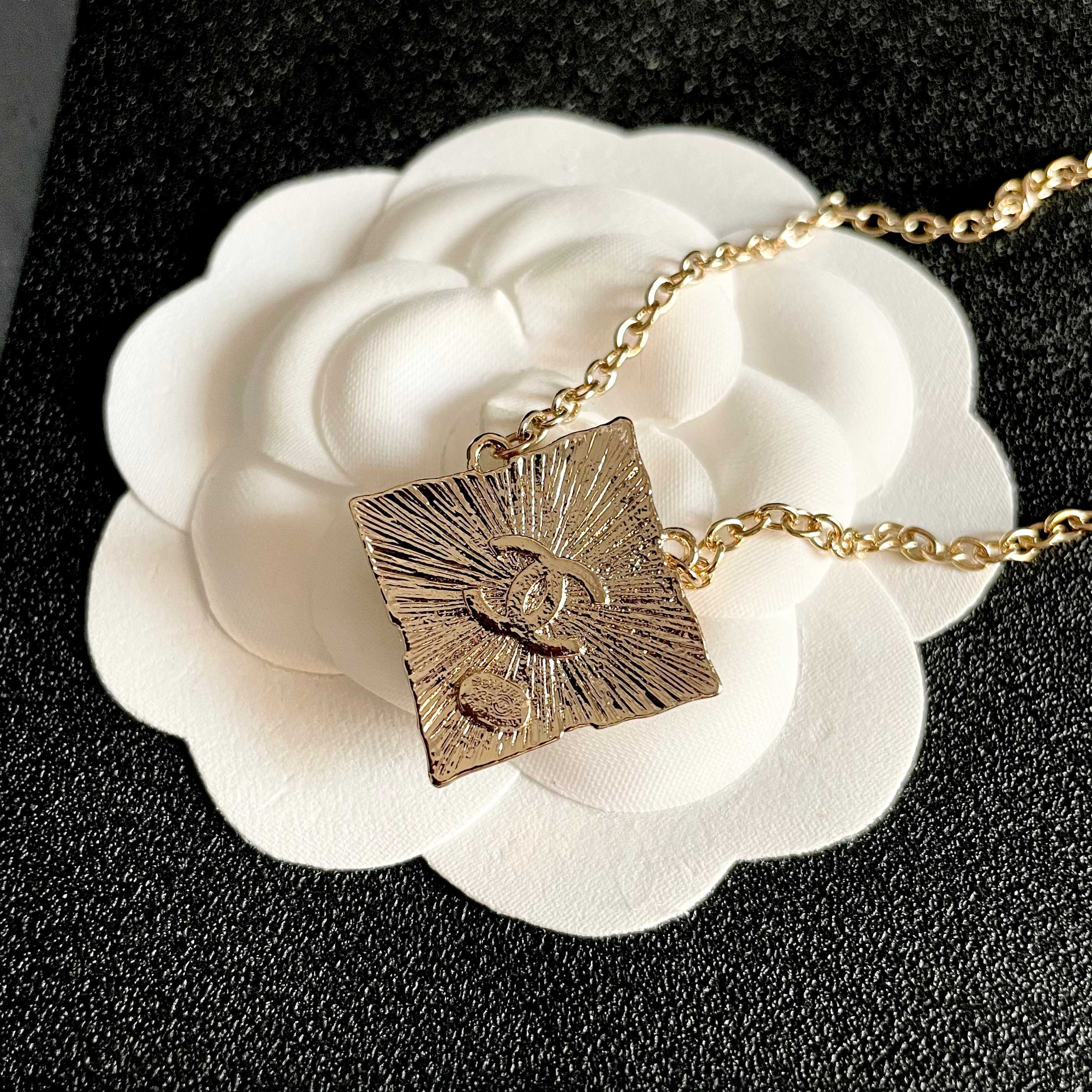 CHANEL 26S DOUBLE C LOGO AMBER CRYSTAL SQUARE PENDANT NECKLACE IN GOLD METAL 633294